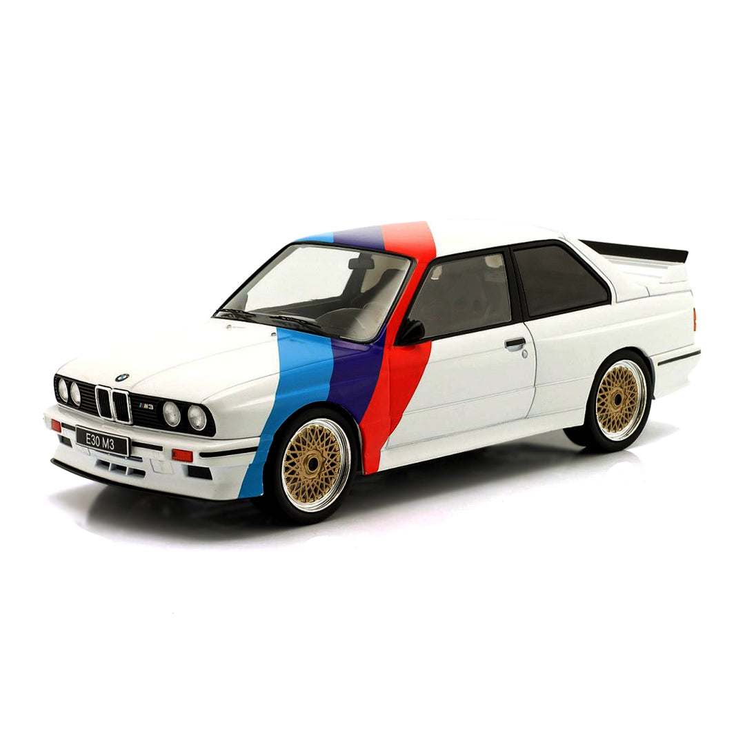 ixo 18CMC123 1/18 BMW E30 M3 1989 White / Blue / Red